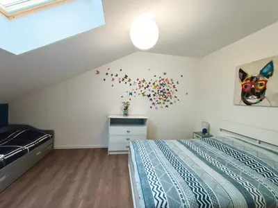Un ou plusieurs lits dans un hébergement de l'établissement Superbe appartement type loft en duplex rue Buat