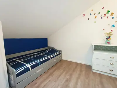 Un ou plusieurs lits dans un hébergement de l'établissement Superbe appartement type loft en duplex rue Buat