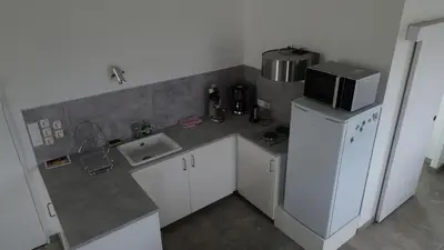 Cuisine ou kitchenette dans l'établissement L ATELIER