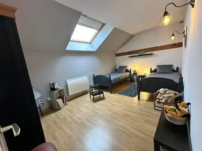 Un ou plusieurs lits dans un hébergement de l'établissement Gîte Cosy Green