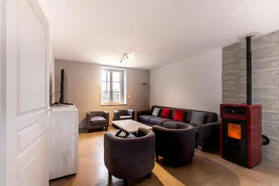 Coin salon dans l'établissement GITE DE L'OURCQ