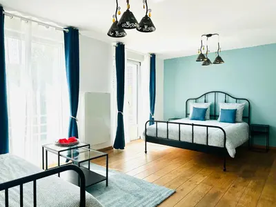 Un ou plusieurs lits dans un hébergement de l'établissement Reims Sherpa Guest House