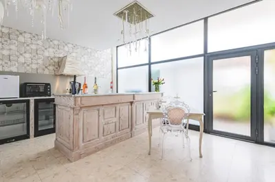 Cuisine ou kitchenette dans l'établissement La Dolce Vita à Epernay