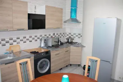 Cuisine ou kitchenette dans l'établissement Bel petit appartement