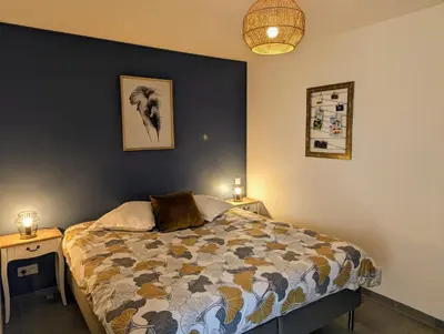 Un ou plusieurs lits dans un hébergement de l'établissement Studio Les chambres de la source - Milouin