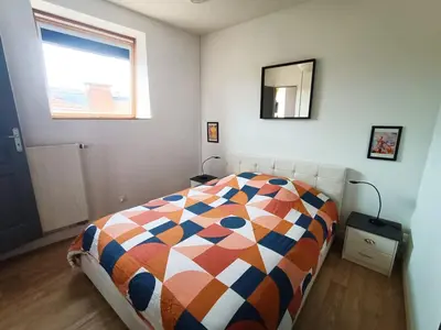 Un ou plusieurs lits dans un hébergement de l'établissement Appartement coeur centre-ville cosy et chaleureux rue Carnot