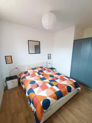 Un ou plusieurs lits dans un hébergement de l'établissement Appartement coeur centre-ville cosy et chaleureux rue Carnot