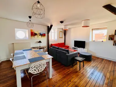Coin salon dans l'établissement Appartement coeur centre-ville cosy et chaleureux rue Carnot