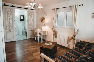 Coin salon dans l'établissement Au charme d'antan