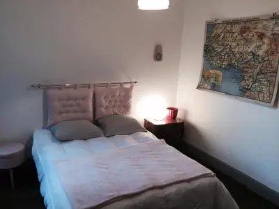 Un ou plusieurs lits dans un hébergement de l'établissement GrIsa'Home le gîte