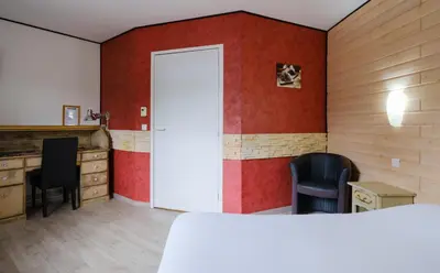 Un ou plusieurs lits dans un hébergement de l'établissement Eqynox Hotel