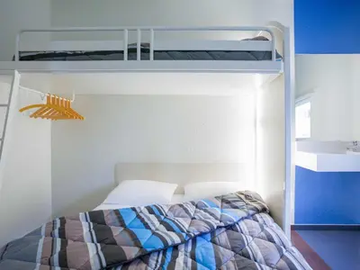 Un ou plusieurs lits dans un hébergement de l'établissement ENZO HOTELS 1er PRIX CHARLEVILLE