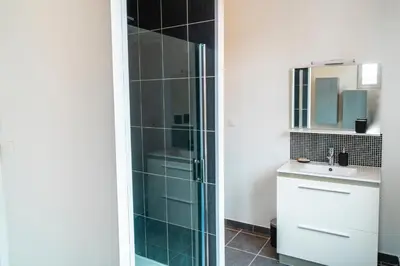 Salle de bains dans l'établissement La suite Delahaye
