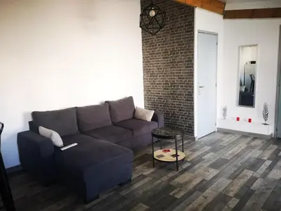 Coin salon dans l'établissement Le Temps d une Pause à Boursault