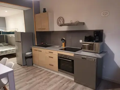 Cuisine ou kitchenette dans l'établissement La Riviera