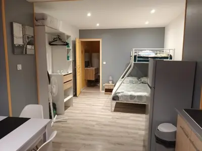 Un ou plusieurs lits dans un hébergement de l'établissement La Riviera