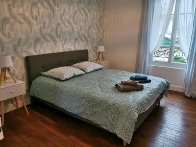 Un ou plusieurs lits dans un hébergement de l'établissement Chez Camille