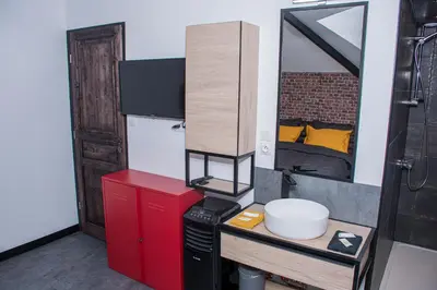 Cuisine ou kitchenette dans l'établissement Meublé de tourisme 3 étoiles Loft industriel à Fismes