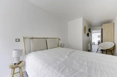 Un ou plusieurs lits dans un hébergement de l'établissement Natural chic au coeur de Reims