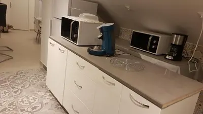 Cuisine ou kitchenette dans l'établissement COLOC SUPERGÎTE SPACIEUX PROCHE TOUTES COMMODITÉS