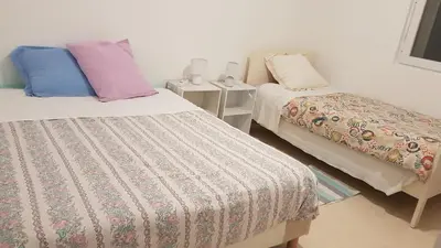 Un ou plusieurs lits dans un hébergement de l'établissement COLOC SUPERGÎTE SPACIEUX PROCHE TOUTES COMMODITÉS