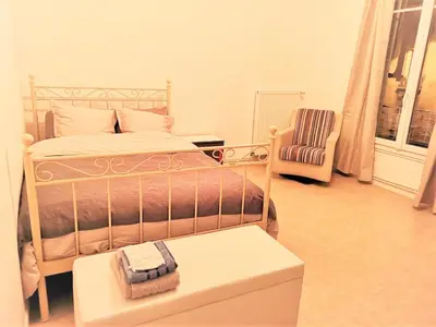 Un ou plusieurs lits dans un hébergement de l'établissement Greyhound - Grand Appartement centre-ville