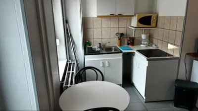 Cuisine ou kitchenette dans l'établissement la chambre de Jade