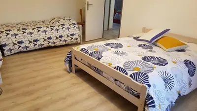 Un ou plusieurs lits dans un hébergement de l'établissement Gîte de la Croisette