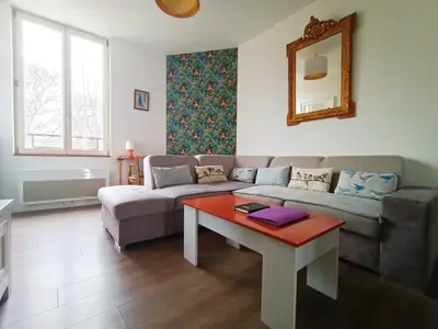 Un ou plusieurs lits dans un hébergement de l'établissement Magnifique appartement proche centre-ville et gare chemin du barrage