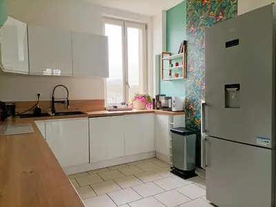 Cuisine ou kitchenette dans l'établissement Magnifique appartement proche centre-ville et gare chemin du barrage