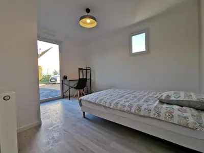 Un ou plusieurs lits dans un hébergement de l'établissement Villa 5 chambres - 3 salles de bain