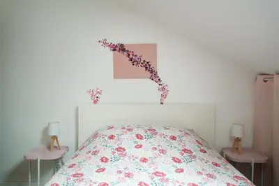 Un ou plusieurs lits dans un hébergement de l'établissement Magnifique duplex 3 chambres proche centre-ville et gare Chemin du Barrage