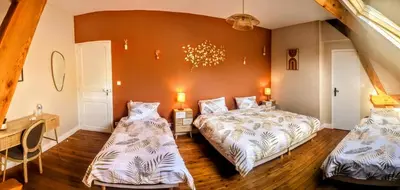 Un ou plusieurs lits dans un hébergement de l'établissement Chambres d'hôtes et logement insolite - Les Canards de la Germaine
