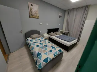 Un ou plusieurs lits dans un hébergement de l'établissement Ardenn'Hotel
