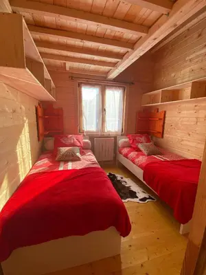 Un ou plusieurs lits dans un hébergement de l'établissement Les Chalets Du Marais