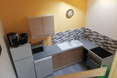 Cuisine ou kitchenette dans l'établissement COPACABANA