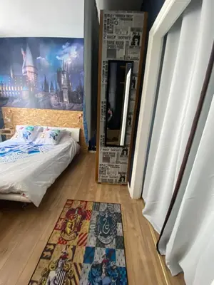 Un ou plusieurs lits dans un hébergement de l'établissement Appartement hyper centre Reims Le gîte du sorcier