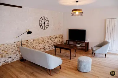 Télévision ou salle de divertissement dans l'établissement Maison d'hôtes 