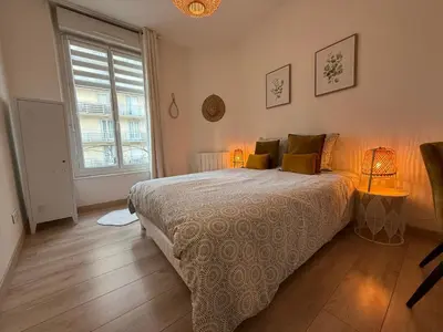 Un ou plusieurs lits dans un hébergement de l'établissement GRAND T3 70m2 ,COSY TOUT CONFORT ,2 CHAMBRES, 6 PERSONNES ,PARKING PRIVÉ SÉCURISÉ