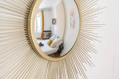 Coin salon dans l'établissement L'haussmannien - Spacieux 4 chambres - Centre - Gare