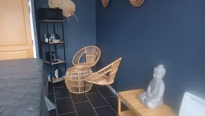 Coin salon dans l'établissement Les Suites Fénelon
