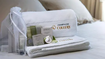 Un ou plusieurs lits dans un hébergement de l'établissement Les Chambres du Champagne Collery