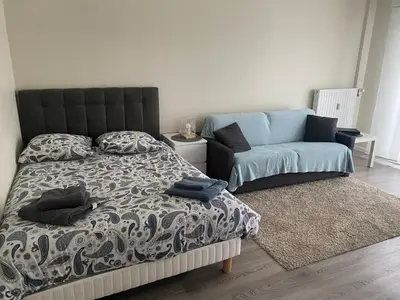 Un ou plusieurs lits dans un hébergement de l'établissement Appartement Parc de Fresnoy