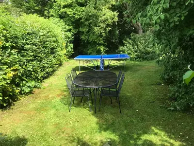 Jardin de l'établissement PAUSE NATURE SORBAIS Gite de groupe avec Piscine, Spas, Sauna avec 8 chambres et 8 salles de bain, grande cuisine et grande salle de vie
