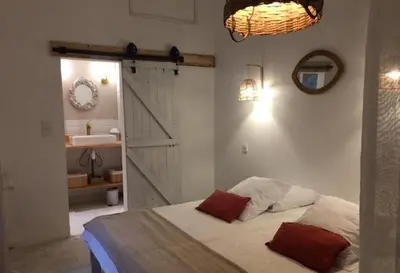 Un ou plusieurs lits dans un hébergement de l'établissement VILLA HENRI