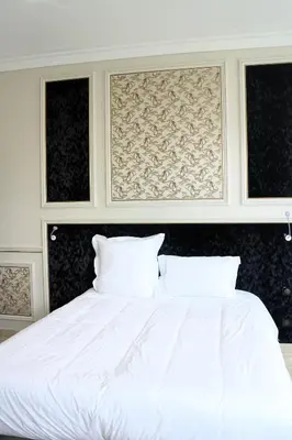 Un ou plusieurs lits dans un hébergement de l'établissement Champagne André Bergère - Guest House