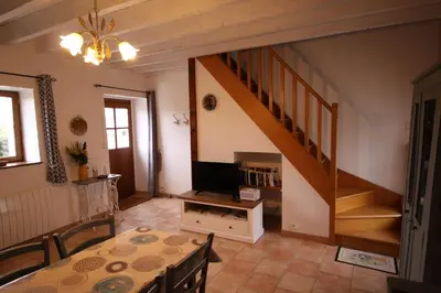 Télévision ou salle de divertissement dans l'établissement Gîte le Pilon