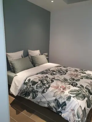Un ou plusieurs lits dans un hébergement de l'établissement Les Suites du Relais