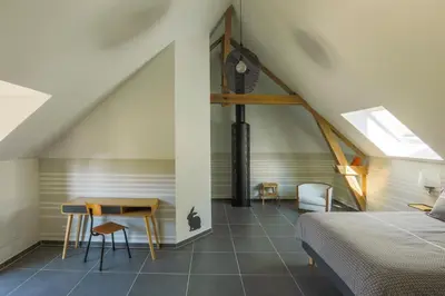 Un ou plusieurs lits dans un hébergement de l'établissement Aux Petits Lapins de Sorval, sauna privé, fitness