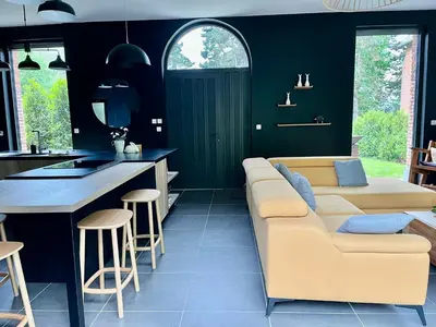 Coin salon dans l'établissement Aux Petits Lapins de Sorval, sauna privé, fitness